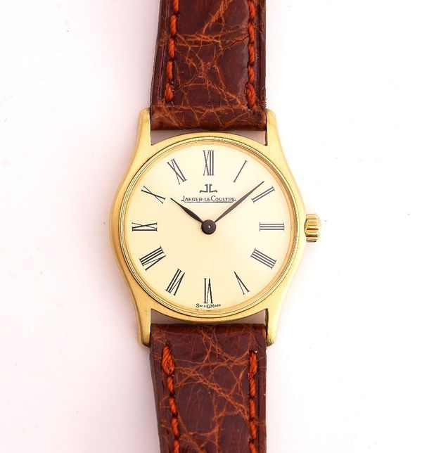 A JAEGER-LE COULTRE 18CT GOLD CIRCULAR CASED LADIES WRISTWATCH