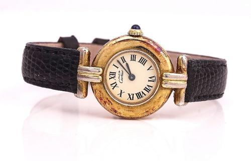 A MUST DE CARTIER LADIES SILVER GILT WRISTWATCH