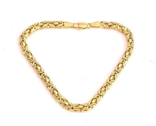 AN 18CT GOLD BRACELET