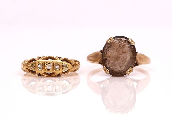 AN 18CT GOLD AND SMOKY QUARTZ RING AND A DIAMOND RING (2)