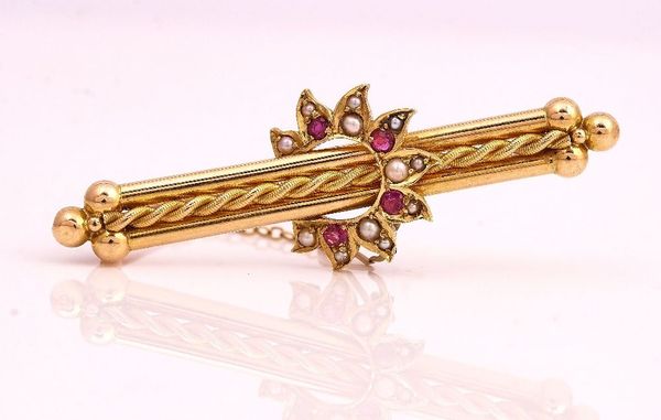 A GOLD SEED PEARL AND RUBY BAR BROOCH