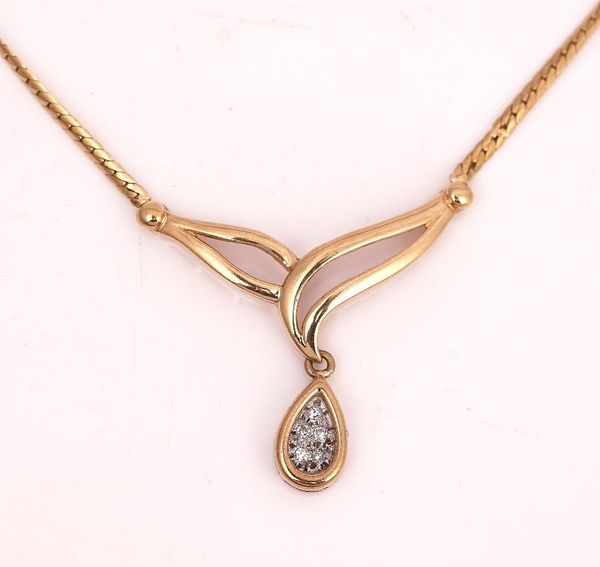 A 9CT GOLD AND DIAMOND SET DROP SHAPED PENDANT NECKLACE