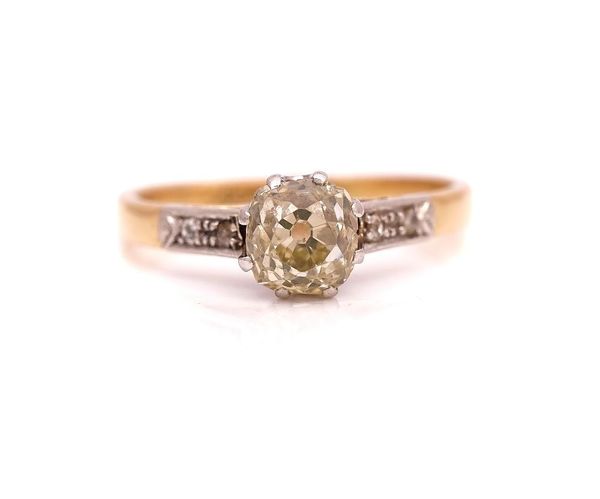 A GOLD AND PLATINUM DIAMOND RING