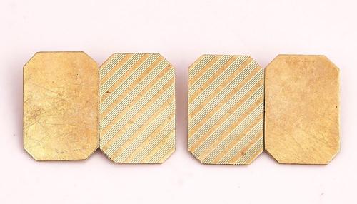 A PAIR OF 9CT GOLD CUT CORNERED RECTANGULAR CUFFLINKS