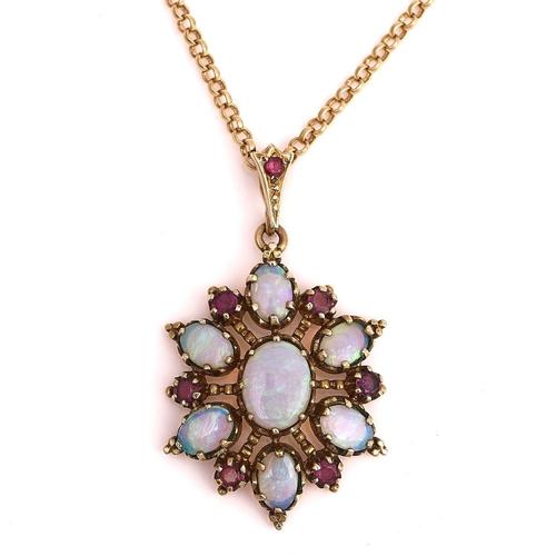 A GOLD, OPAL AND MAUVE GEM SET PENDANT WITH A 9CT GOLD NECKCHAIN (2)