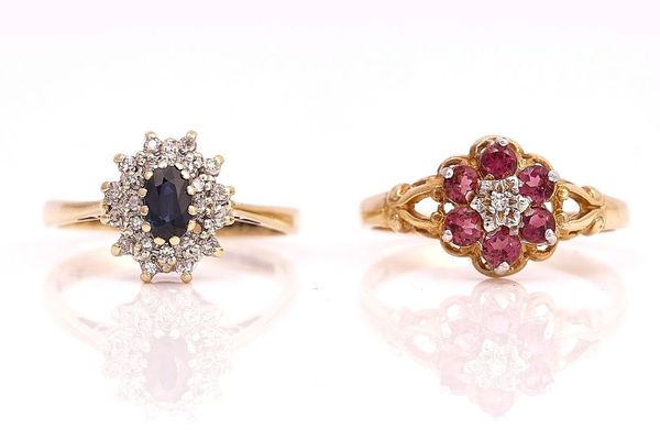 A 9CT GOLD, SAPPHIRE AND DIAMOND CLUSTER RING AND A 9CT GOLD RUBY AND DIAMOND CLUSTER RING (2)