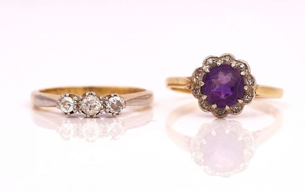 A GOLD AND PLATINUM, DIAMOND THREE STONE RING AND ANOTHER RING (2)