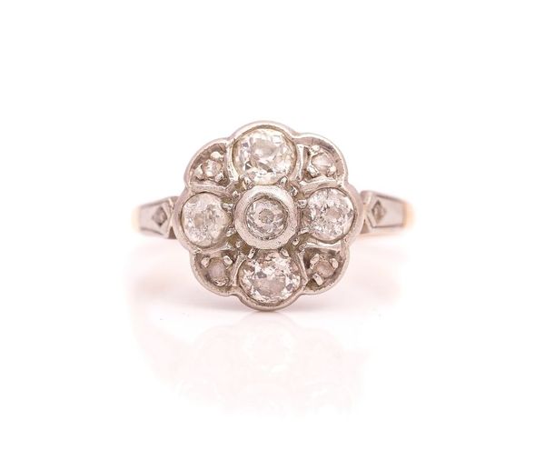 A GOLD AND PLATINUM, DIAMOND SET CLUSTER RING