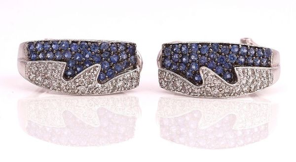 A PAIR OF WHITE GOLD, SAPPHIRE AND DIAMOND EAR CLIPS