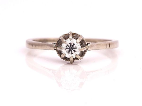 A WHITE GOLD AND DIAMOND SINGLE STONE RING