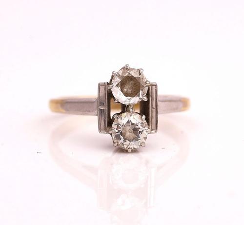 A GOLD AND PLATINUM DIAMOND TWO STONE RING
