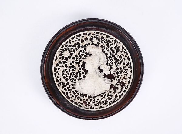 A CARVED IVORY MEDALLION OF EMPRESS CATHERINE THE GREAT