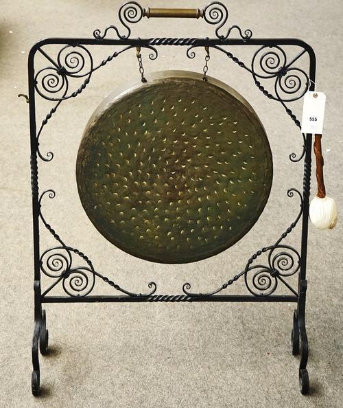 A WROUGHT IRON & BRASS GONG