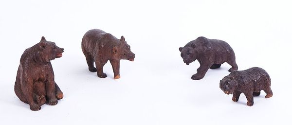 FOUR BLACK FOREST CARVED WOOD BEARS