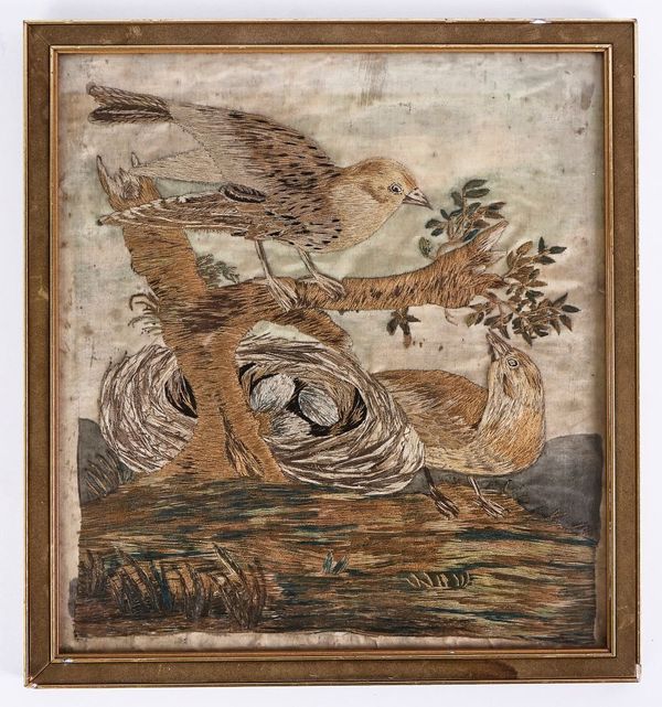 AN ENGLISH SILK WORK EMBROIDERED PICTURE OF A NESTING BIRDS