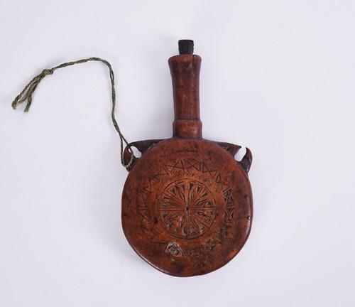 FOLK ART: A CHIP-CARVED TREEN POWDER FLASK