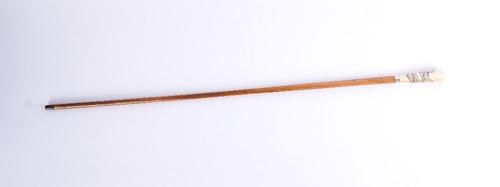 A JAPANESE CARVED IVORY MOUNTED WALKING CANE