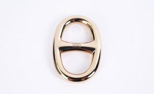A HERMES D-ANCHOR GILT-METAL SCARF RING