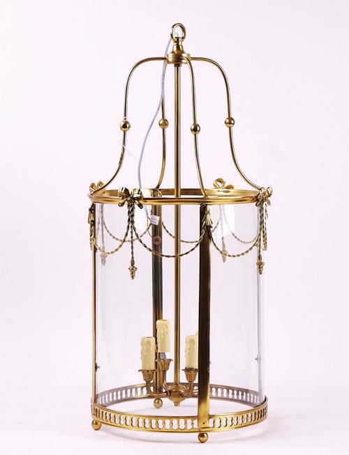A POLISHED BRASS CYLINDRICAL HALL LANTERN
