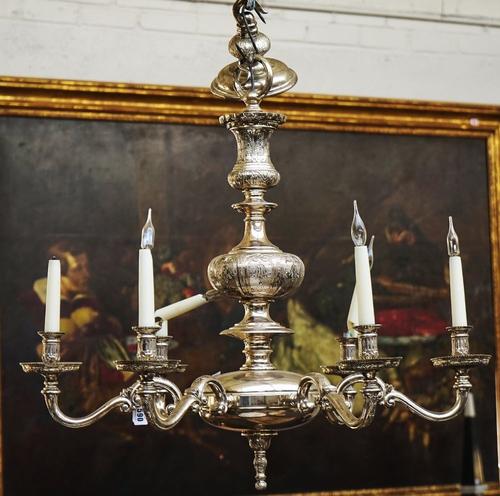 A QUEEN ANNE STYLE SILVERED-METAL SIX LIGHT CHANDELIER