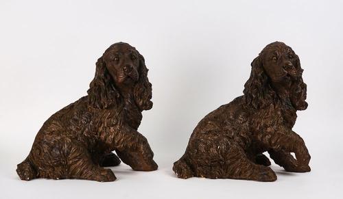 TWO PAINTED PLASTER MODELS OF SEATED SPANIELS (2)