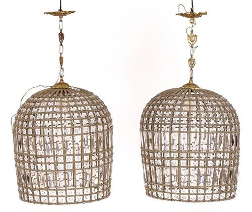 A PAIR OF BEADED AND FACETED GLASS HANGING LIGHTS (2)