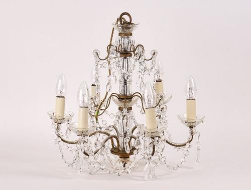WITHDRAWN: A BRASS AND GLASS SIX-LIGHT CHANDELIER AND A PAIR OF SILVERED-METAL AND GLASS TWIN-LIGHT WALL APPLIQUÉS (3)