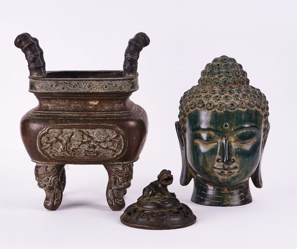 A SOUTH-EAST ASIAN GREEN PATINATED METAL HEAD OF BUDDHA AND A BRONZE JARDINIERE (3)