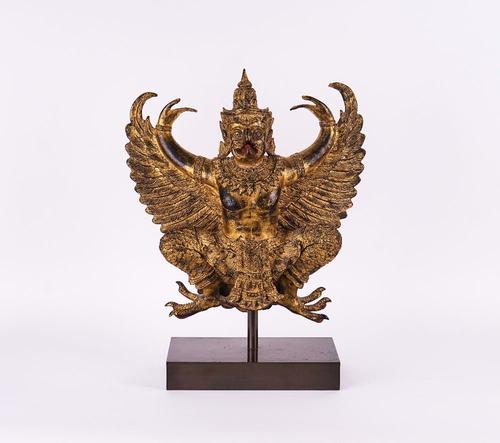 A SOUTH-EAST ASIAN GILT-METAL FIGURE OF THE HINDU GOD GARUDA