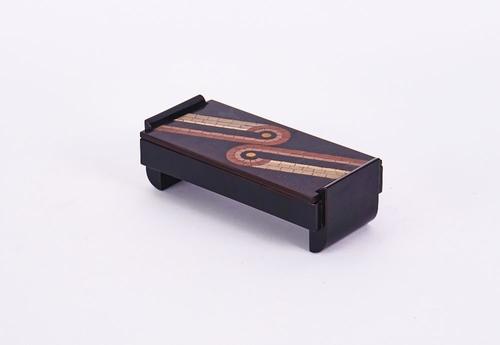 AN ART DECO BLACK LACQUER MOSAIC DESK CASKET