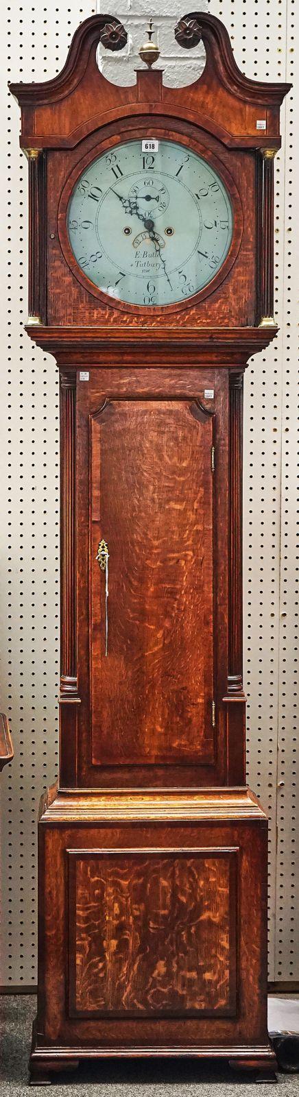 A GEORGE III OAK LONGCASE CLOCK