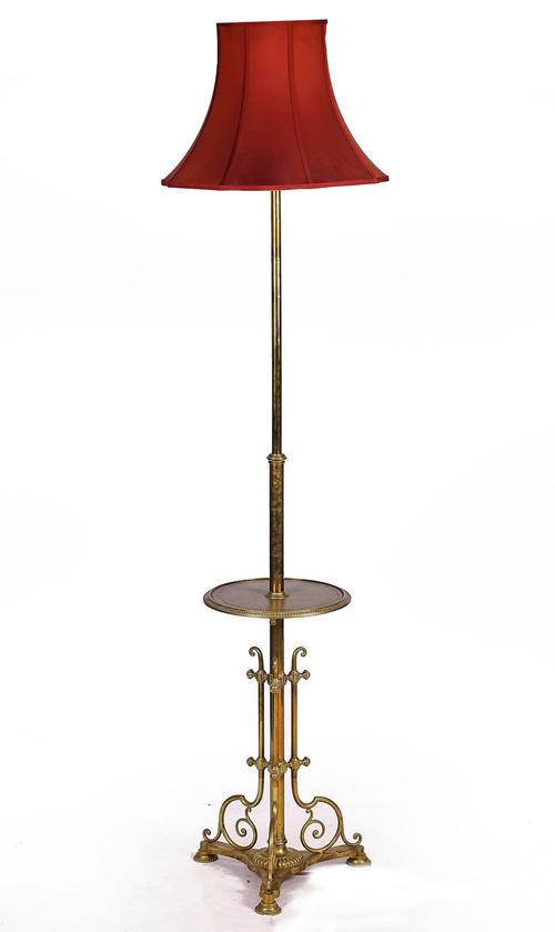 A BRASS HEIGHT-ADJUSTABLE STANDARD LAMP