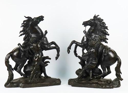 A PAIR OF PATINATED BRONZE MARLY HORSES