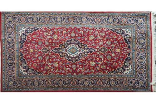 AN ESFAHAN PART SILK RUG, PERSIAN