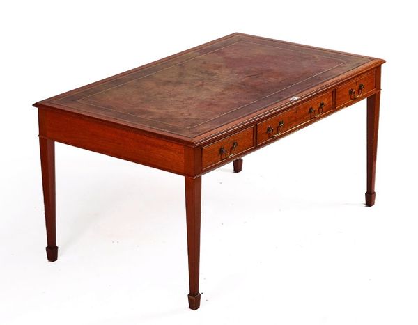A GEORGE III STYLE MAHOGANY THREE DRAWER LIBRARY CENTRE TABLE