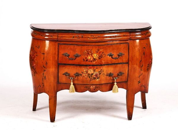 AN 18TH CENTURY STYLE CONTINENTAL BOMBE SHAPED THREE DRAWER COMMODE