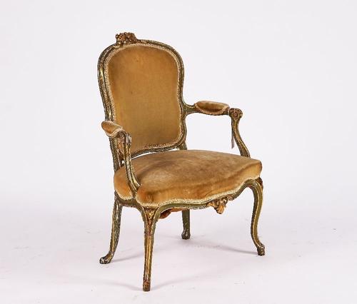 A LOUIS XV GREEN PAINTED PARCEL-GILT OPEN ARMCHAIR