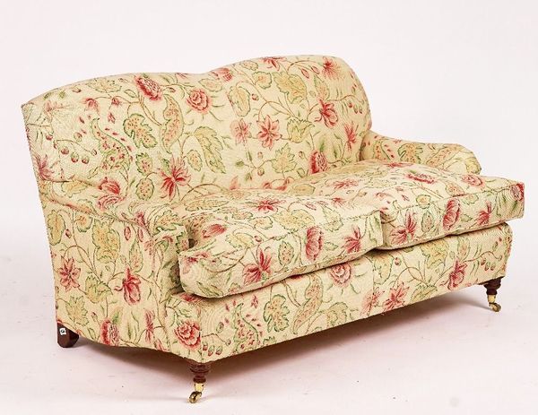 A DOUBLE HUMP-BACK TWO SEAT SOFA