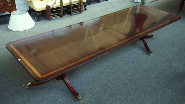 A GEORGE II STYLE CROSSBANDED MAHOGANY ‘D’ END EXTENDING DINING TABLE