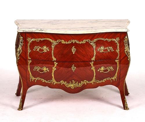 A LOUIS XV STYLE GILT-METAL MOUNTED KINGWOOD COMMODE