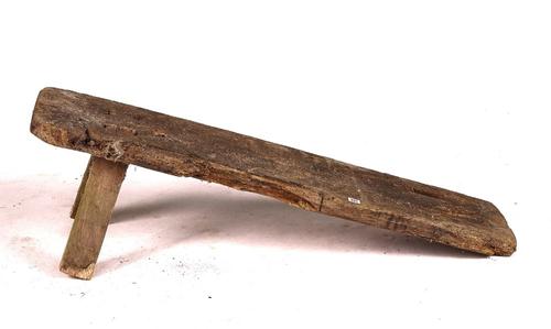 A RECTANGULAR OAK SLAB TOP PIG BENCH