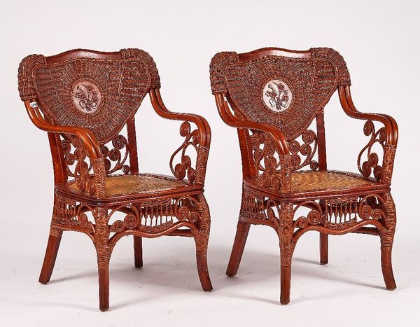 A PAIR OF 20TH CENTURY HARDWOOD AND RATTAN OPEN ARM CONSERVATORY CHAIRS (2)