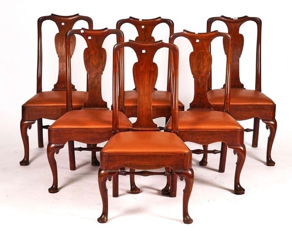 A MATCHED SET OF SIX 18TH CENTURY WALNUT FRAMED VASE BACK DINING CHAIRS