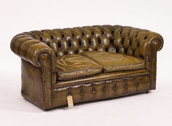 A GREEN LEATHER UPHOLSTERED BUTTONBACK CHESTERFIELD
