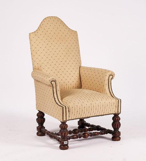 A 17TH CENTURY STYLE ARCH-BACK EASY ARMCHAIR
