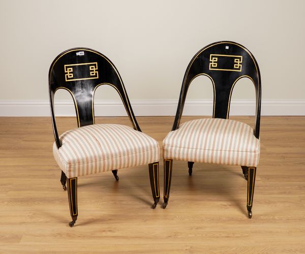 A PAIR OF PARCEL GILT EBONISED TUB BACK SIDE CHAIRS (2)