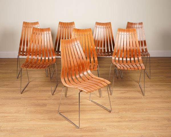 HANS BRATTRUD FOR HOVE MOBLER; A SET OF EIGHT SLATTED TEAK AND TUBULAR CHROME DINING CHAIRS (8)