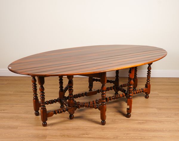 THEODORE ALEXANDER; A 17TH CENTURY STYLE DOUBLE GATELEG ACTION WAKE TABLE