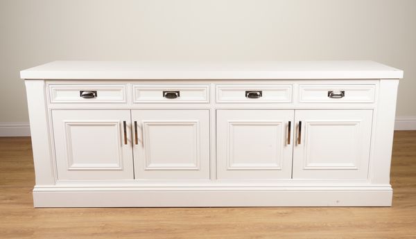 A MODERN WHITE PAINTED SIDE CABINET WITH FOUR DRAWERS OVER CUPBOARD