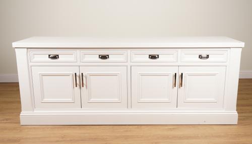 A MODERN WHITE PAINTED SIDE CABINET WITH FOUR DRAWERS OVER CUPBOARD